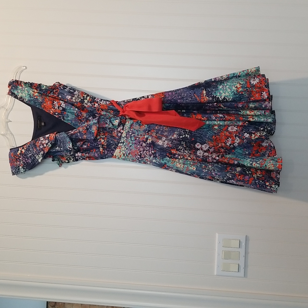 Beautiful Ted Baker floral wrap dress with orange ribbon tie.  Size 1.